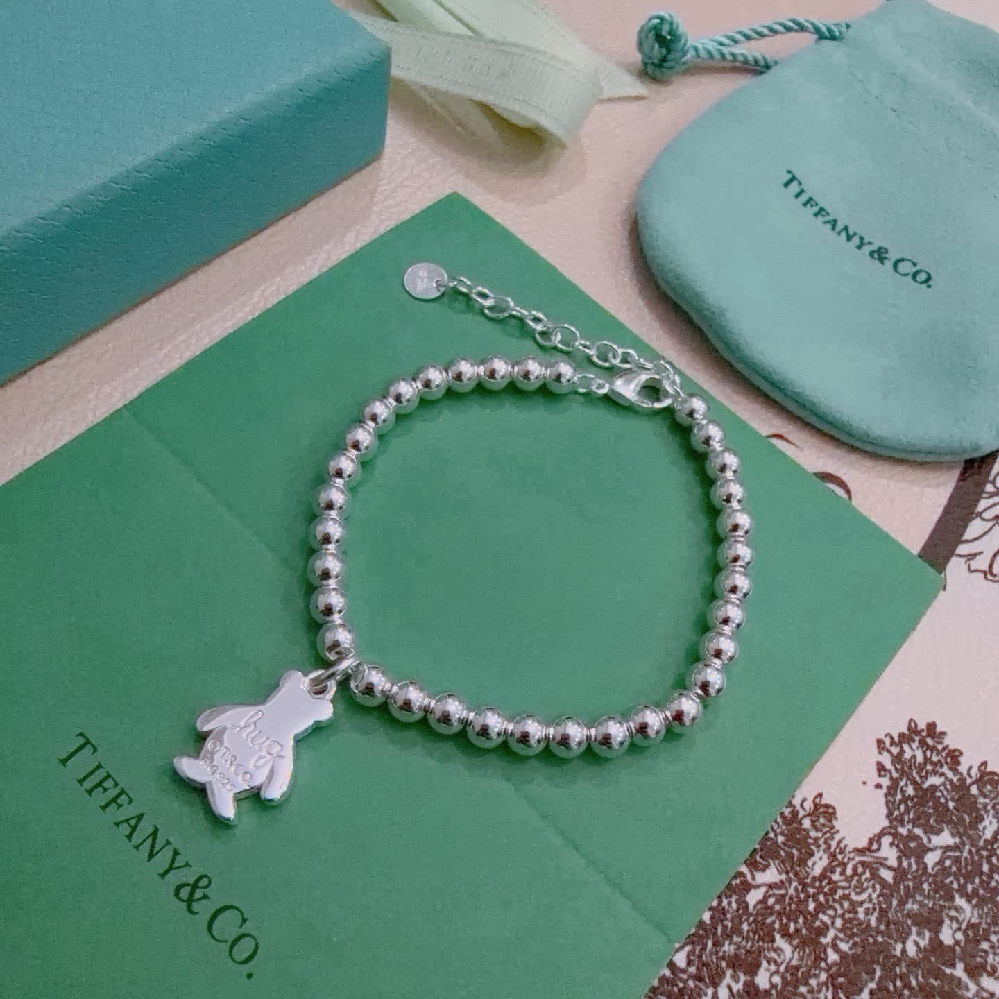 Tiffany & Co. Sterling Silver Beaded Bracelet with Huggy Bear Charm
